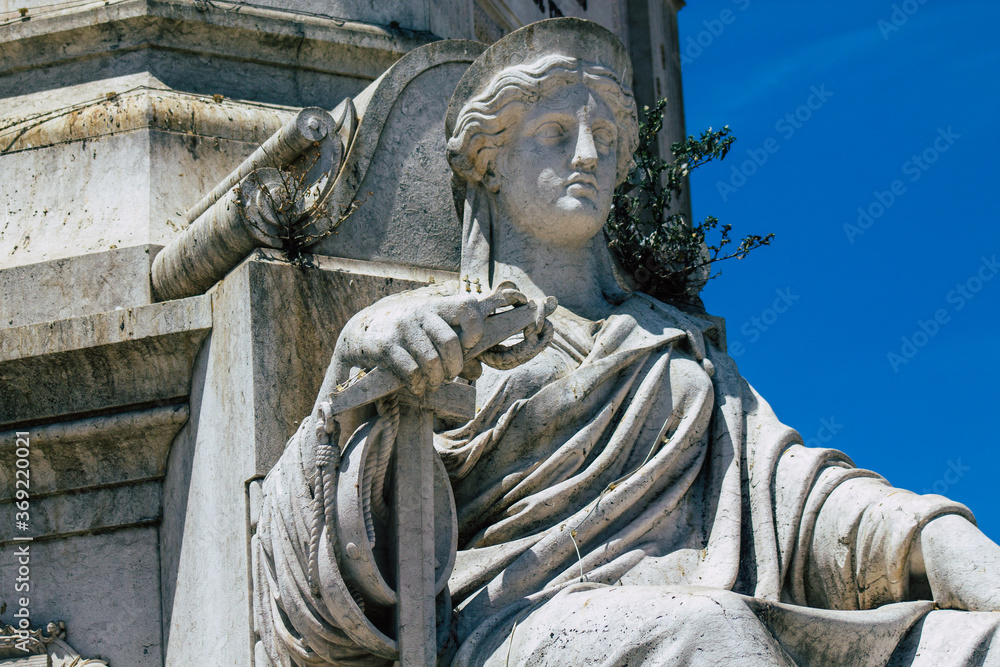 View of a monument in the downtown area of Lisbon, the hilly coastal capital city of Portugal and one of the oldest cities in Europe View of a monument in the downtown area of Lisbon, the hilly coastal capital city of Portugal and one of the oldest cities in Europe