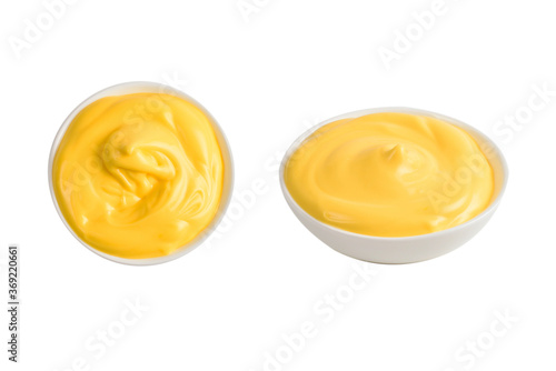 Photos Cheese sauce in white plate on white background.