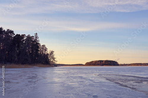 Frozen beach and icy sea on a sunset in Ruissalo  Finland.