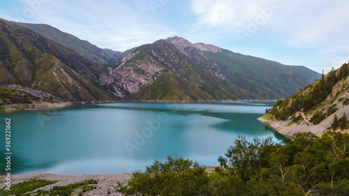Beautiful mountain turquoise color lake Karasuu in Tian-Shan, Kyrgyzstan.
