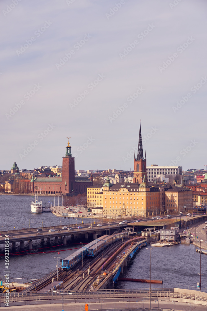 Gamla Stan island, an old city of Stockholm on a sunset with cloudy sky on the background.