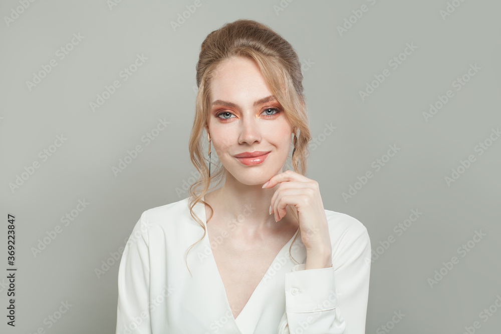 Smiling woman with healthy clear skin. Facial treatment and skincare concept Smiling woman with healthy clear skin. Facial treatment and skincare concept
