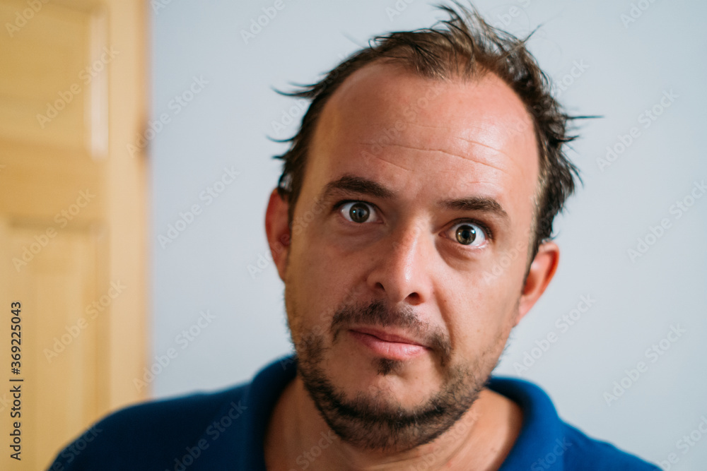Fototapeta premium Crazy man looking at the camera
