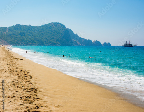 Fototapeta panorama of cleopatra beach in Alanya with blue sea and clean sand