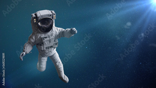 astronaut in empty space lit by the stars