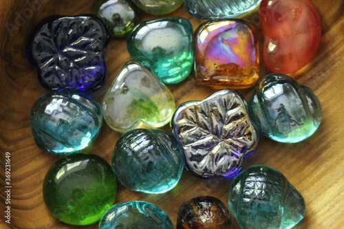 Glass pieces lie on a wooden surface