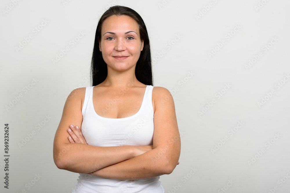 Portrait of beautiful woman against white background Portrait of beautiful woman against white background