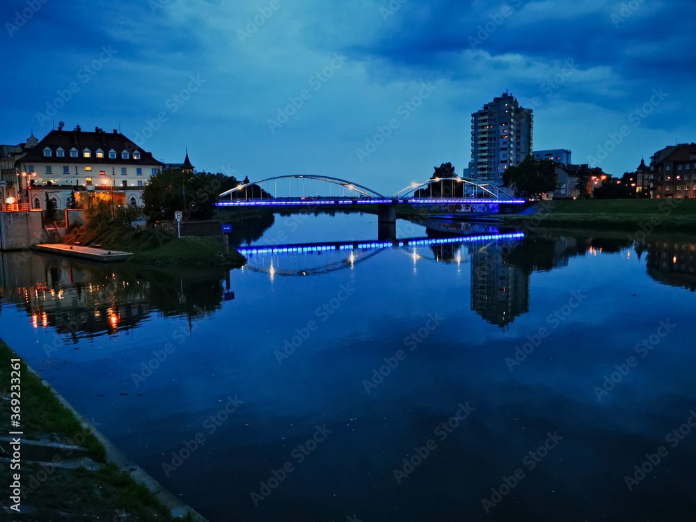 Dark clouds over Opole. Bridge on the Odra River in Opole. Storm clouds over the river.