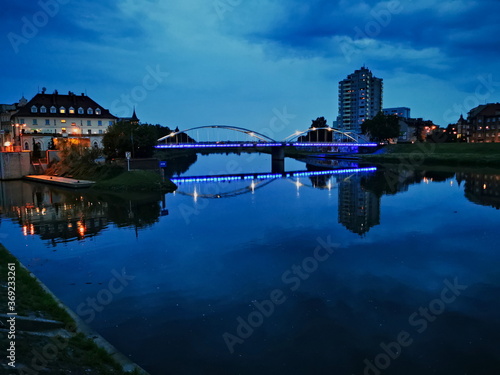 Dark clouds over Opole. Bridge on the Odra River in Opole. Storm clouds over the river.