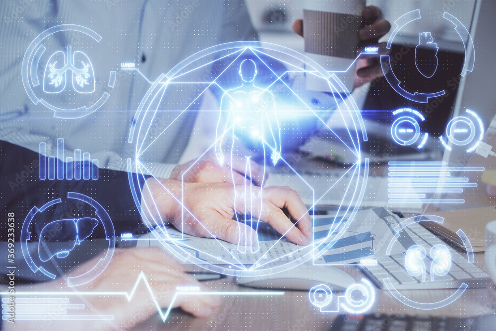 Science hologram with man working on computer on background. Concept of study. Double exposure. Science hologram with man working on computer on background. Concept of study. Double exposure.