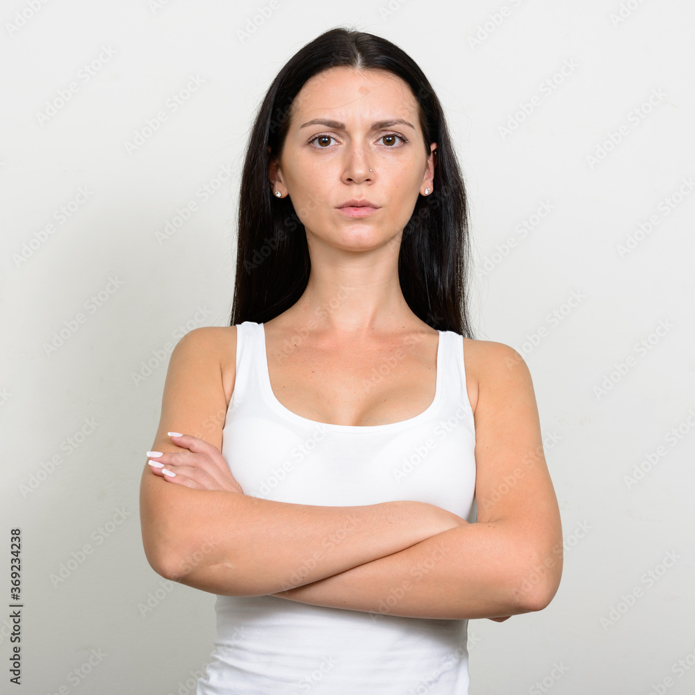 Portrait of beautiful woman against white background Portrait of beautiful woman against white background