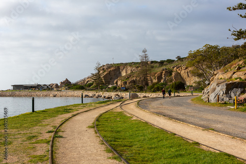 The iconic horse drawn cart and iconic rock formations on Granite Island Victor Harbor South Australia on August 3 2020 © Darryl