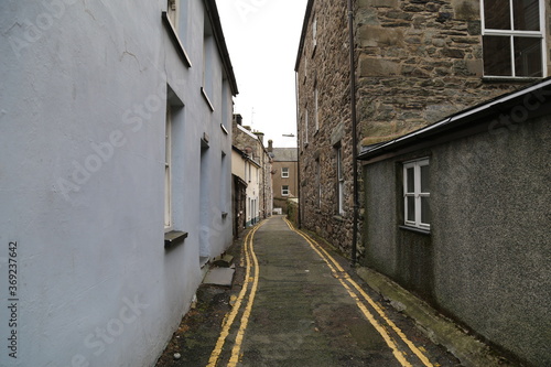 Fototapeta Naklejka Na Ścianę i Meble -  A very narrow, quaint back street in the seaside town of Barmouth, Gwynedd, Wales, UK.