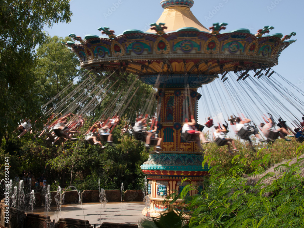 carousel in amusement park fair in motion