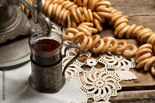 Slika na platnu Russian traditional tea-drinking: a samovar, drying and tea in cup holder