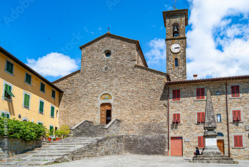 Exterior view of the facade of abbey of San Gaudenzio in San Godenzo. Built in the 11th century in Romanesque style, is one of the milestone of the Dante's Way (Dante's Way). photo