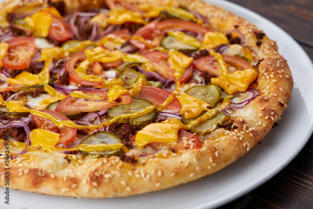 pizza on the wooden background pizza on the wooden background