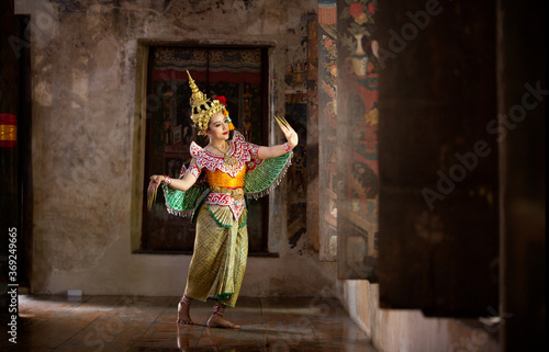 Beautiful Thai young woman portrait in Kinnaree traditional dress costume Art culture Thailand Dancing in masked khon Kinnaree in literature amayana, thailand culture Khon, Ayuttaya, Thailand . photo