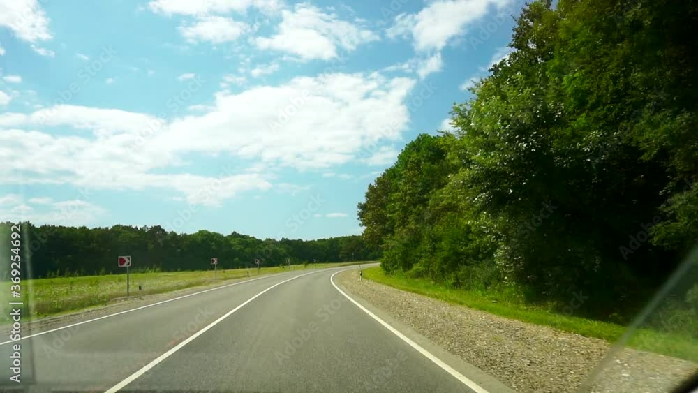 Point of view of vehicle driving on empty road. Point of view of vehicle driving on empty road.