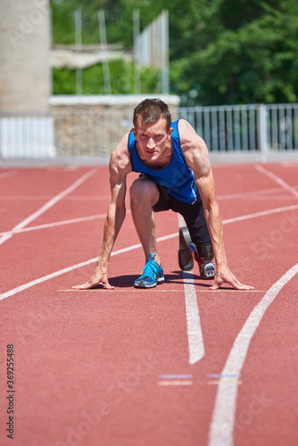 Running start of adaptive sportsman on track