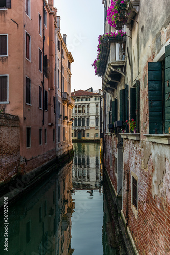 View of the  water channels  bridges and old palaces in Venice at sunrise during the lockdown