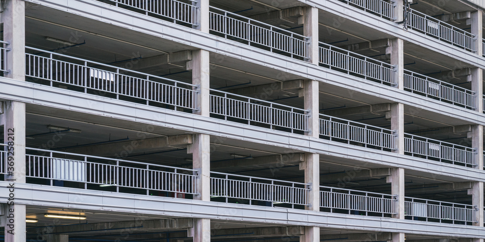 building balconies with grey handrails and concrete beams building balconies with grey handrails and concrete beams