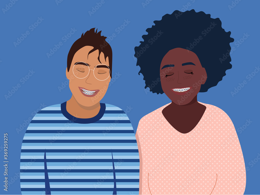 Two teenagers smiling with dental braces on their teeth.Boy and girl different ethnicities.Orthodontic metal retainers for bite correction.Oral daily life hygiene,care.Afro-american,caucasian person Two teenagers smiling with dental braces on their teeth.Boy and girl different ethnicities.Orthodontic metal retainers for bite correction.Oral daily life hygiene,care.Afro-american,caucasian person