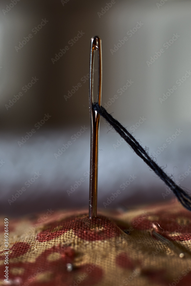 Sewing needle with threaded thread Sewing needle with threaded thread