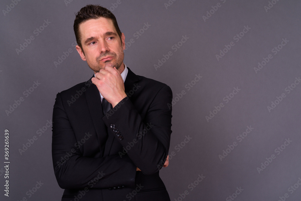 Portrait of handsome bearded businessman in suit Portrait of handsome bearded businessman in suit