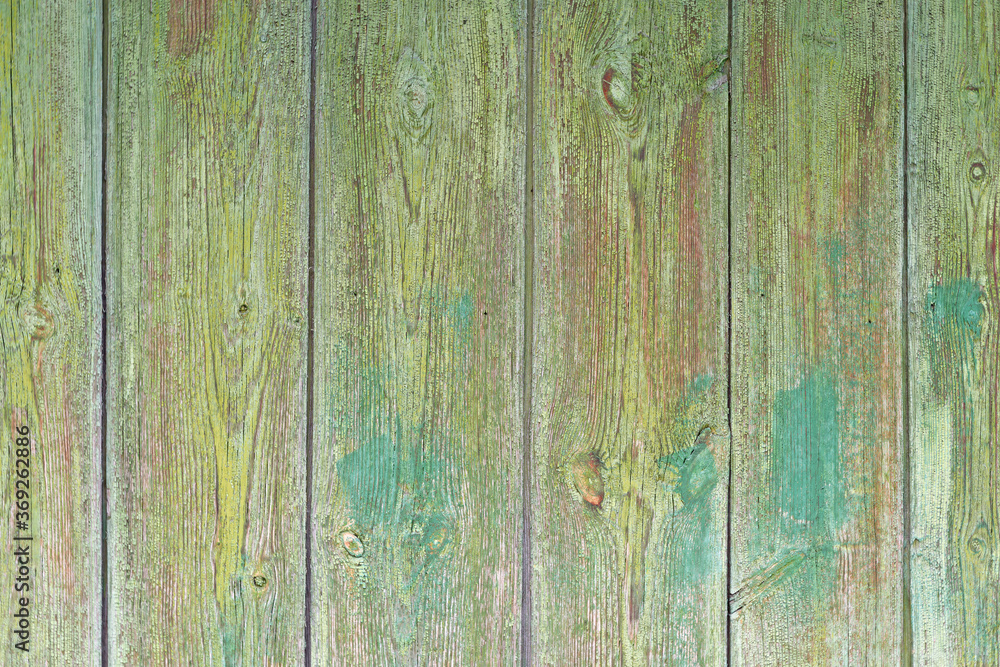 Obraz premium Wood texture. A fragment of an old wooden fence close-up.
