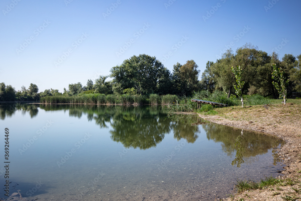 lake in the park, reflection. The picture was taken in Serbia, near Sabac 