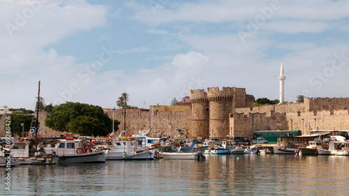 Marine Gate and the fortifications of the Old Town of Rhodes, view from Mandraki harbour, Rhodes, Greece