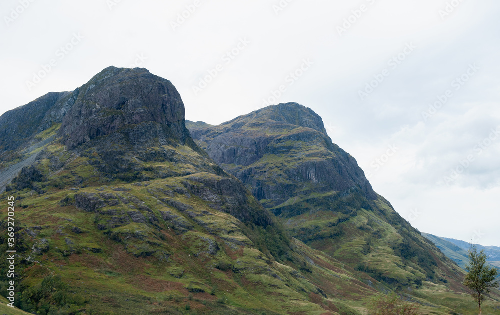 Fototapeta premium Two peaks of the Three Sisters in Glencoe, Scottish Highland,