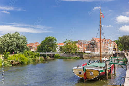 Fotografiet Historic wooden ship in the harbor of Ribe, Denmark