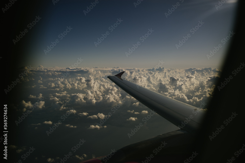 View in a cloudy sky from the airplane window View in a cloudy sky from the airplane window