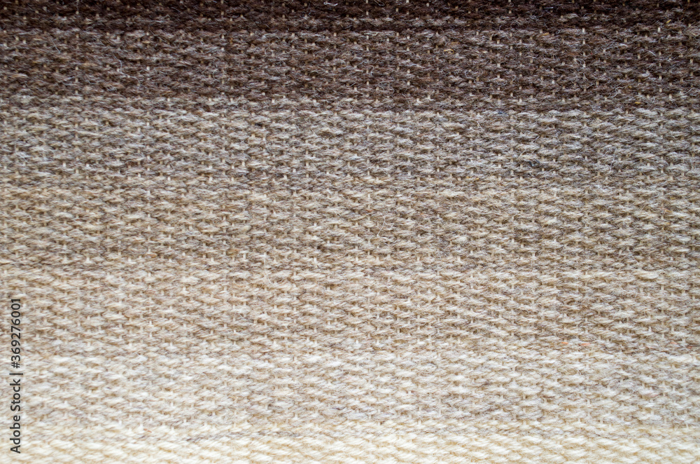 New rug in iridescent colors from ecru to brow close New rug in iridescent colors from ecru to brow close