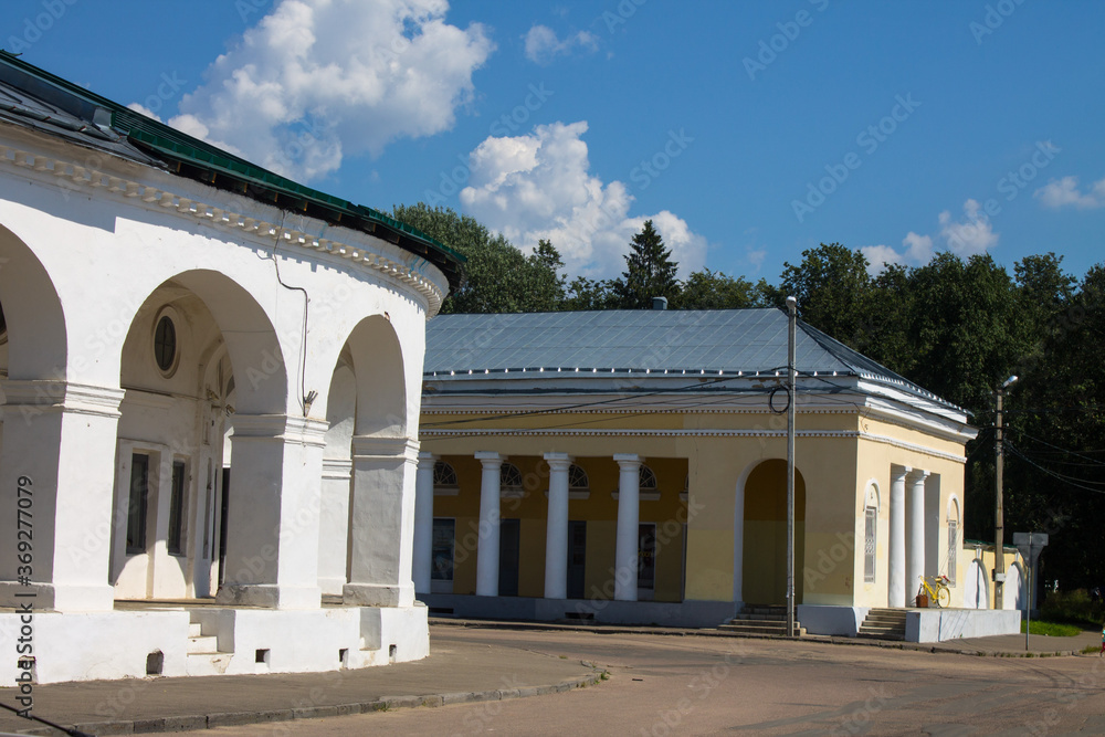 white stone Red rows with columns in the old city of Kostroma Russia on a clear summer day and space for copying