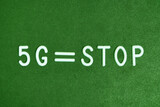 5G technology, stop progress, technology progress concept on a green background.