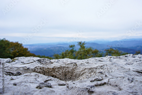 Mountain landscape and blue sky. Green tree