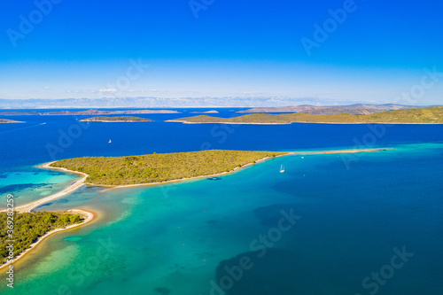 Amazing seascape on Adriatic sea, turquoise water on the island of Dugi Otok in Croatia, aerial view from drone