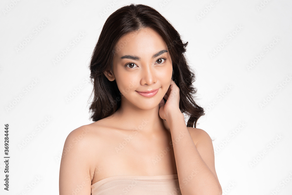 Beautiful Young asian Woman with Clean Fresh Skin on white background, Face care, Facial treatment, Cosmetology, beauty and spa, Asian women portrait Beautiful Young asian Woman with Clean Fresh Skin on white background, Face care, Facial treatment, Cosmetology, beauty and spa, Asian women portrait