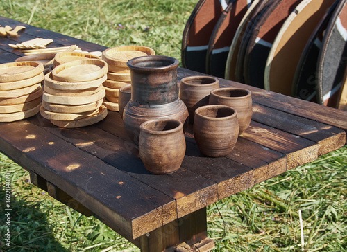 Fototapeta Earthenware for meals at the camp camp in nature