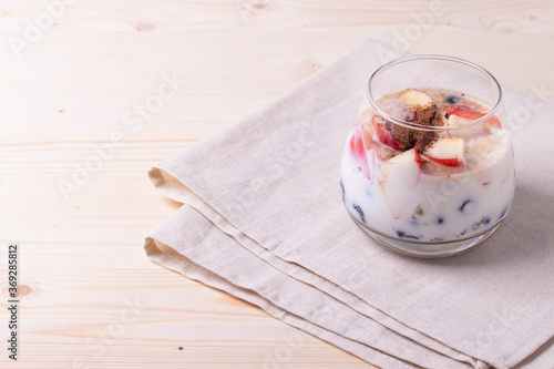 yumy milky desert or yughurt with fruit and berries