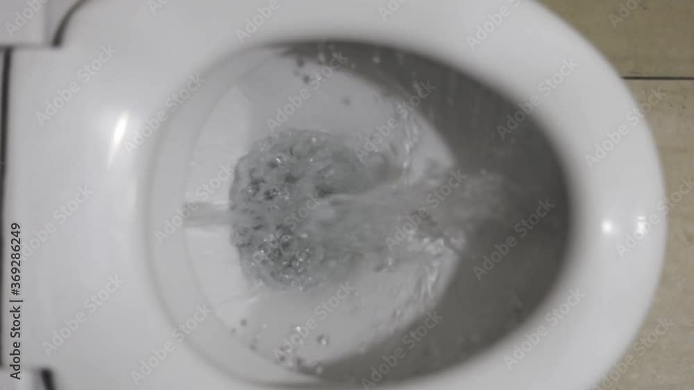top view of the flushing water in the toilet top view of the flushing water in the toilet