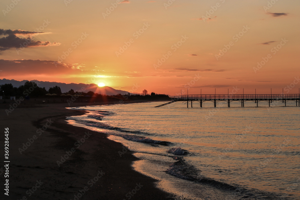 Fototapeta premium sunset at sea. variety of colors and hues of the rising sun
