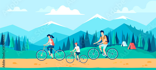 Happy family riding bicycles during summer vacation
