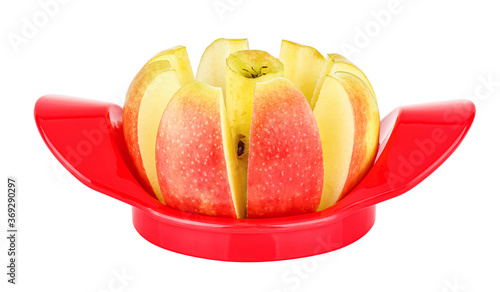 Ripe and juicy colorful apple sliced with a apple cutter isolated on white background
