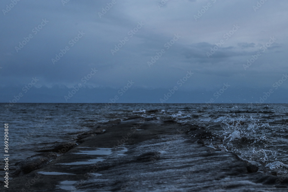 sea wave crashes on the rocky coast sea wave crashes on the rocky coast