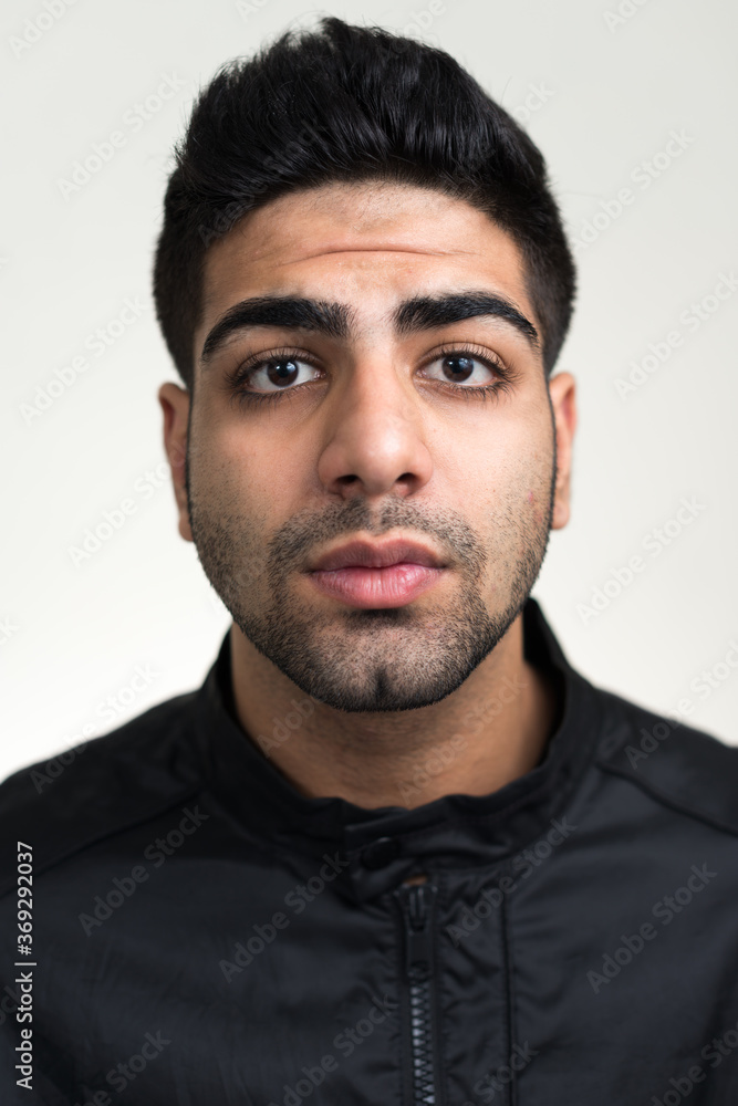 Portrait of young handsome bearded Indian man Portrait of young handsome bearded Indian man