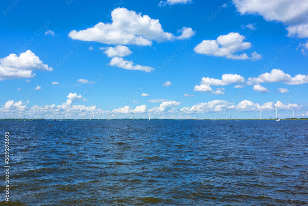 Landscape with former sea and new land and windmills in the Netherlands
Landscape with former sea and new land and windmills in the Netherlands